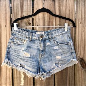 FREE PEOPLE DISTRESSED CUTOFF SHORTS